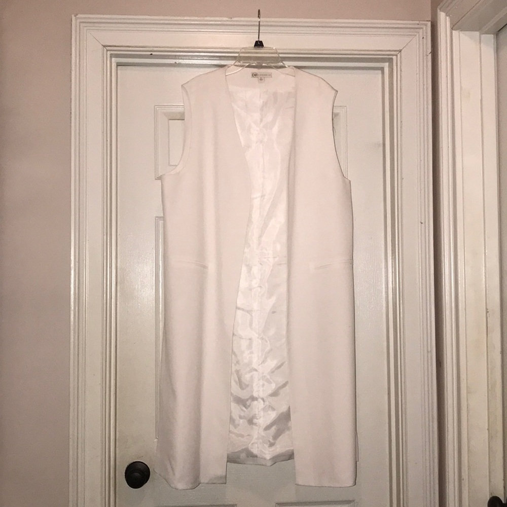 Women’s Long Vest faux pockets.